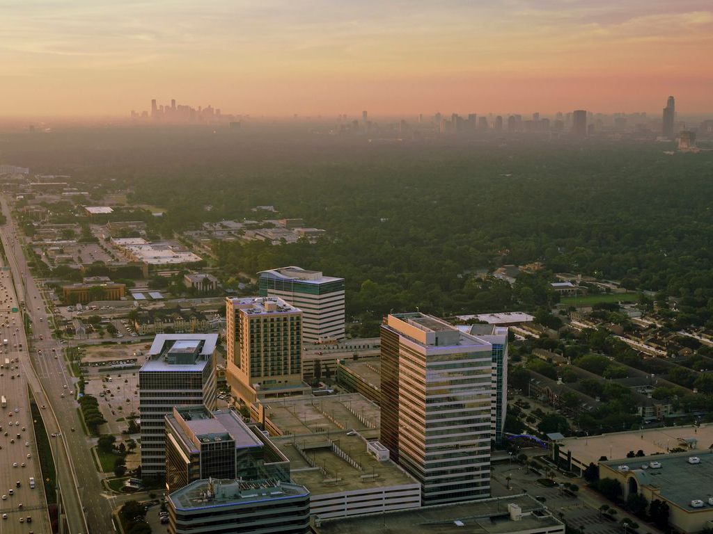 Termite Control Service in Katy, Texas Aerial view of Katy Freeway with Houston Downtown skyscrapers in the background