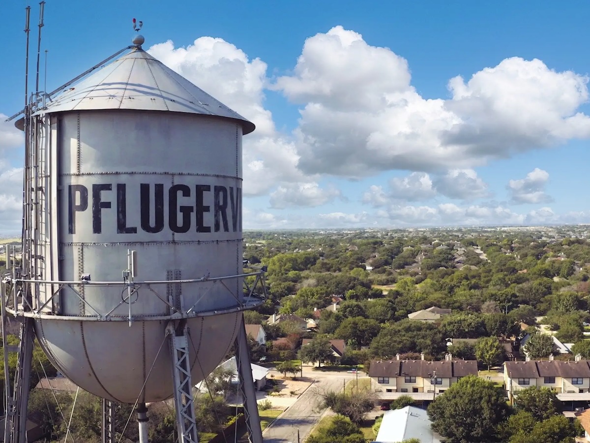 Termite Control Service in Pflugerville, Texas Old water tower overlooking the city of Pflugerville, Texas